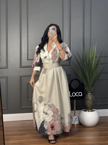 فستان من قماش الكتان وبحزام عريض من لوكا فاشن