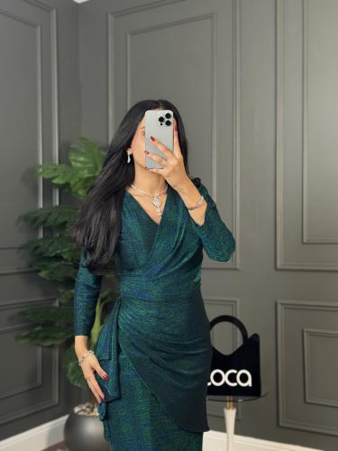 فستان ناعم لون تركوازي وبتصميم يخطف الانظار من لوك...