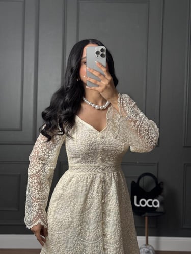 فستان بنقوش مميزه من براند لوكا فاشن