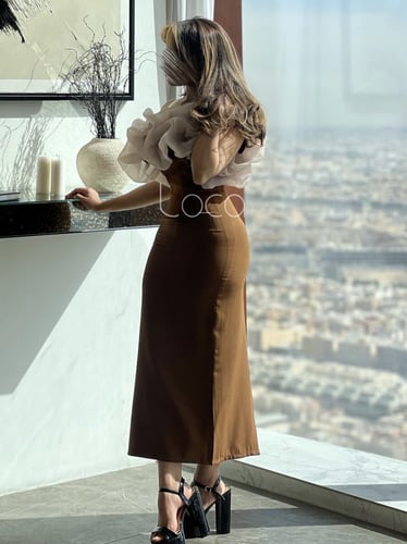 فستان ناعم بلمسات من الاورقانزا