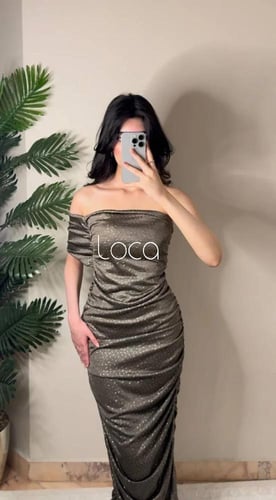 فستان سهرة بترولي مميز بلمعات انيقة استرتيش