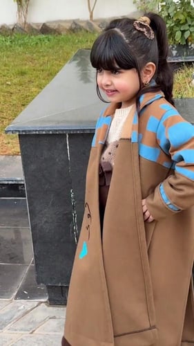 فروه شتوي أنيق للأطفال بتصميم يجمع بين الدفء واللم...