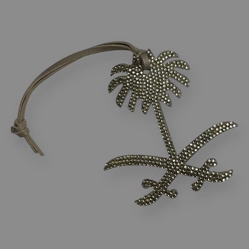 تعليقة سيفين ونخلة المملكة