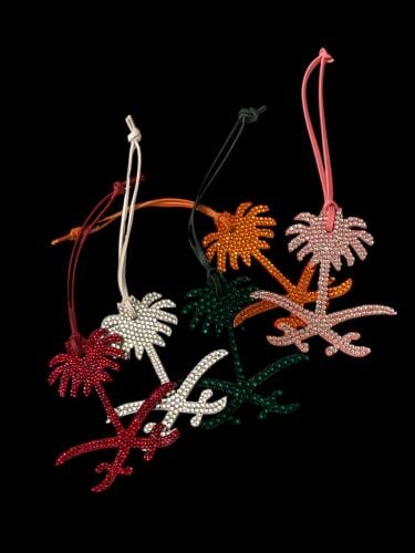 تعليقة سيفين ونخلة المملكة