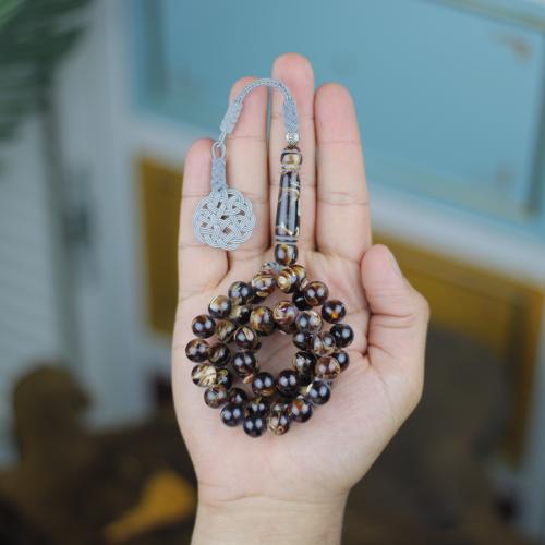 سبحة "عين النمر" (Tiger Eye) – فخامة الرخام البني