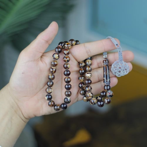 سبحة "عين النمر" (Tiger Eye) – فخامة الرخام البني