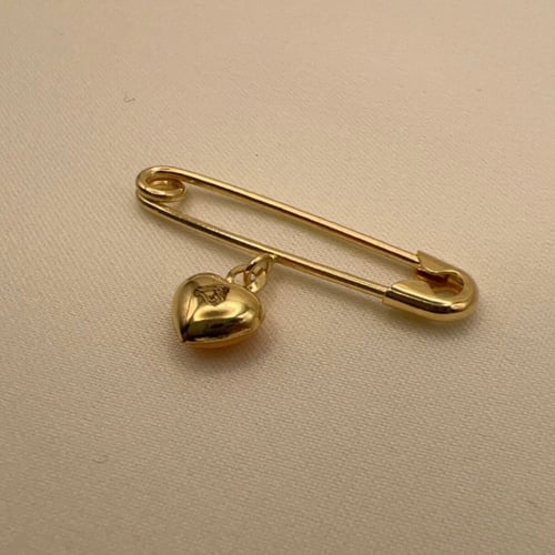 بروش برتقالي قلب عيار 18