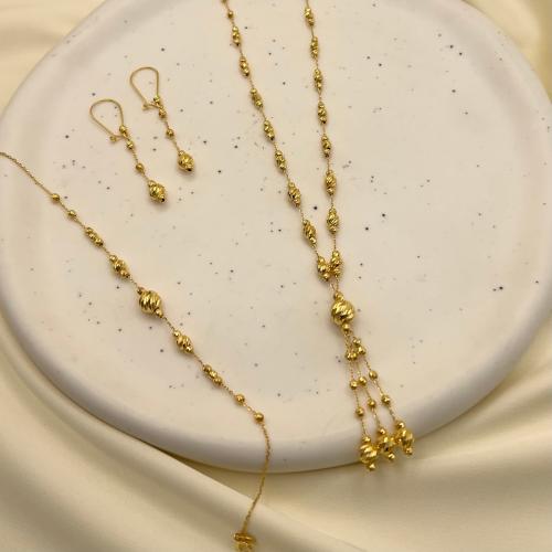 نص طقم عيار 21