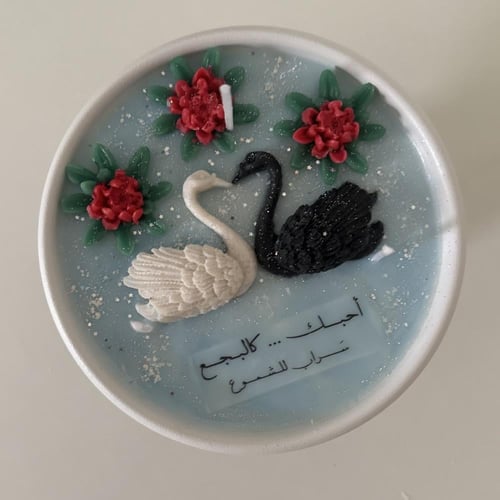 بجعتان بالبحيرة و ورود اللوتس | دوڤ