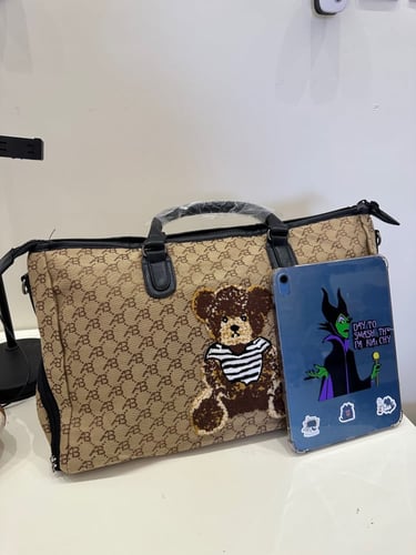 شنطة لون جيشي متعددة الاستخدامات