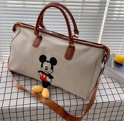 شنطة ثيم دزني متعددة الاستخدامات (لون بيج)