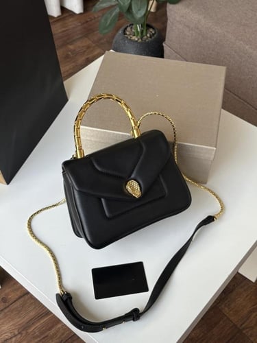 شنطه الثعبان الفاخره