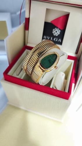 ساعة ثعبان مينا اخضر بكرستال ذهبي