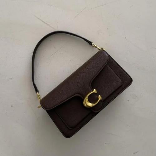 كوتش تابي بني
