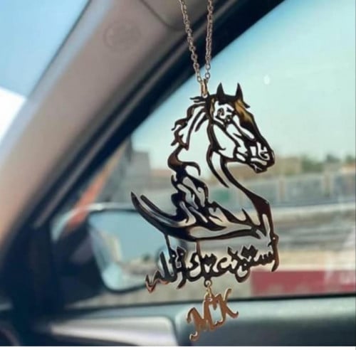 تعليقه سياره مطليه ذهب