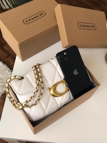 شنطة كوتش تابي