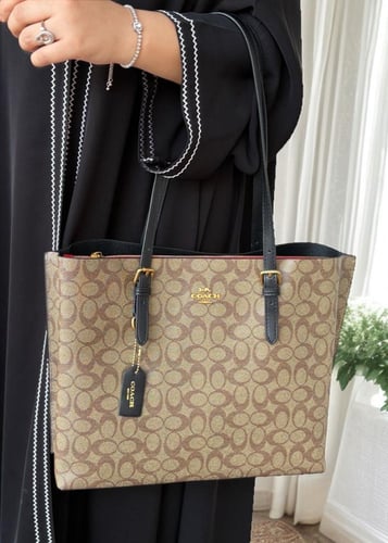 شنطة كوتش مولي توت باق