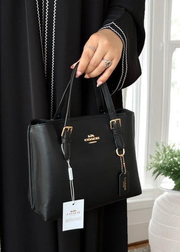 شنطة كوتش مولي توت باق