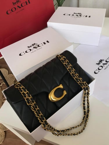 شنطة كوتش تابي