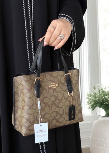 شنطة كوتش مولي توت باق