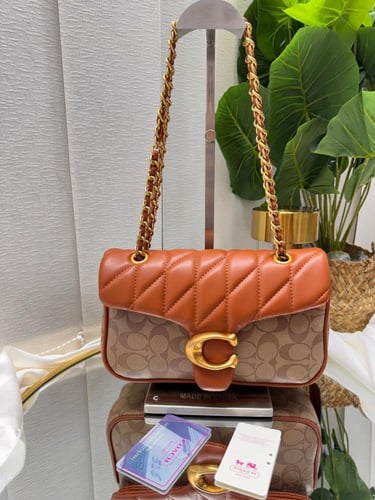 شنطة كوتش تابي