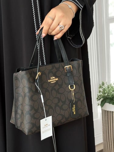 شنطة كوتش مولي توت باق