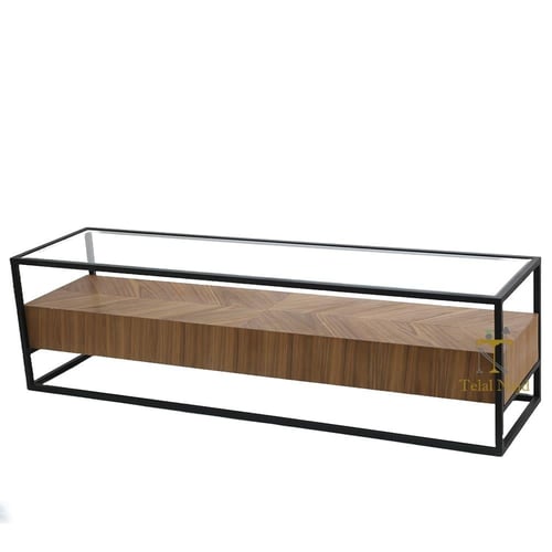 طاولة تلفزيون قاعدة حديد لون اسود سطح زجاج شفاف وق...