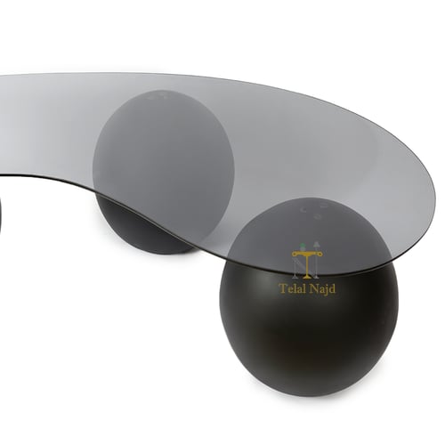 طاولة تقديم فوق كور من الرخام الصناعي لون اسود ناع...