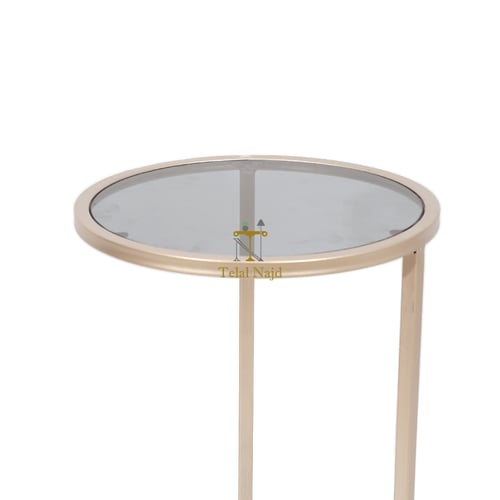 طاولة خدمة قاعدة حديد لون شمباني زجاج اسود شفاف