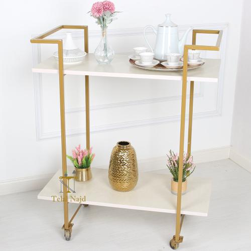 عربية تقديم لون ذهبي 2 دور سطح خشبي اللون بيج