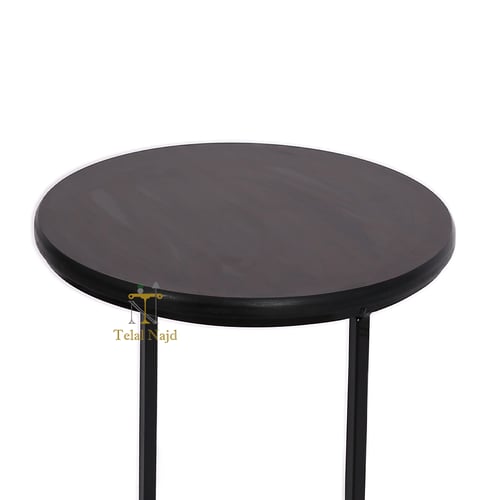 طاولة خدمة لون أسود شكل دائري قاعدة حديد وسطح خشب...