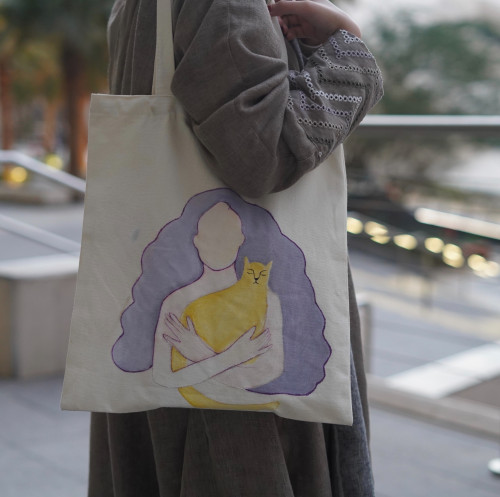 The woman with her cat