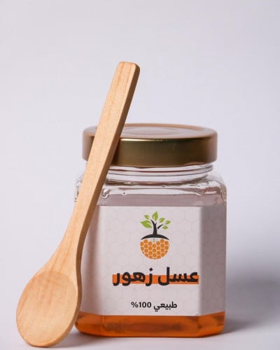 عسل زهور مستورد. نصف كيلو