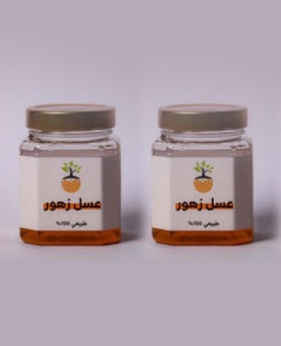 عسل زهور مستورد. 2 نصف كيلو