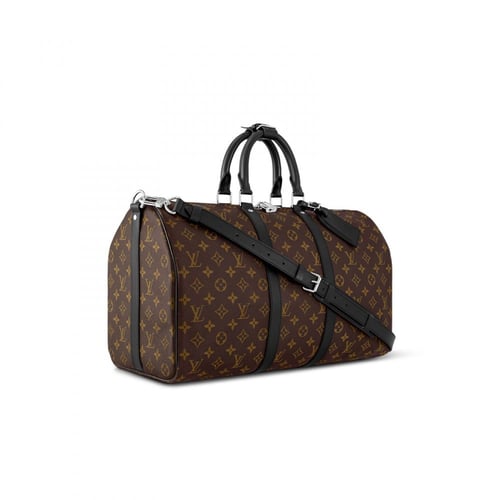 شنطة سفر يد لويس فيتون