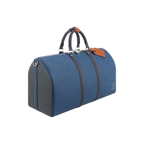 شنطة سفر يد لويس فيتون