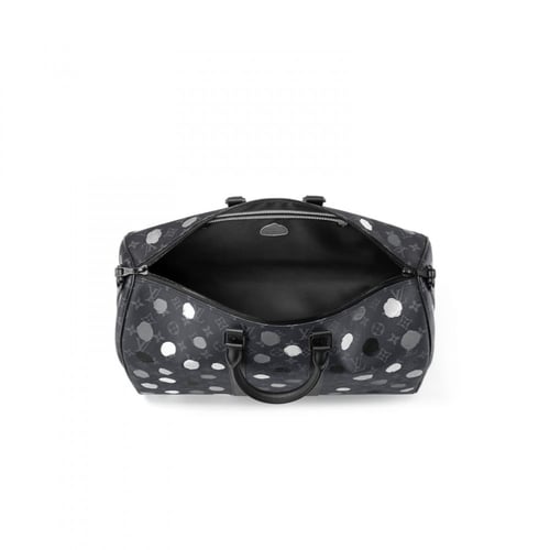 شنطة سفر يد لويس فيتون