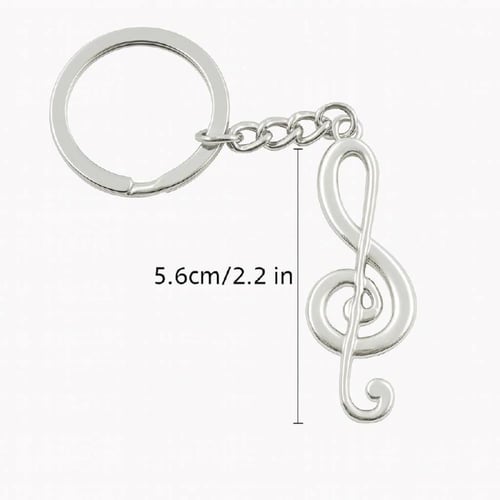 ميدالية مفاتيح فضية بشكل نوتة