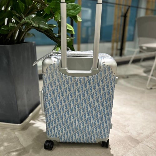 حقيبه سفر ديور x ريموا