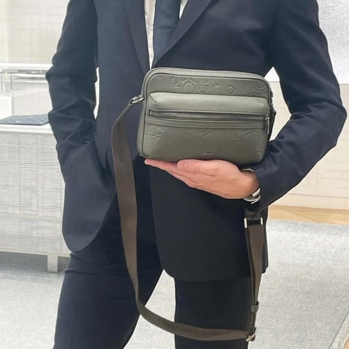 حقيبه ديور للجنسين