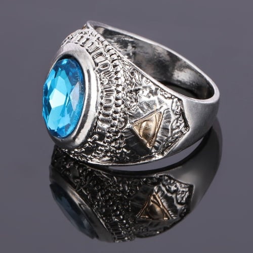 خاتم فضي مزين بنقوش وحجر زيركون ازرق