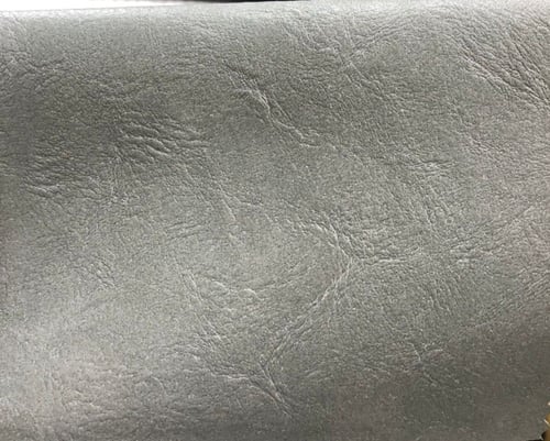 كرسي بذراعين جلد