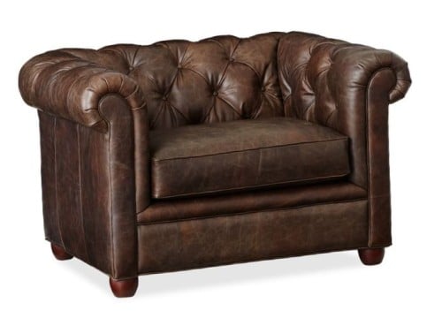 كرسي بذراعين جلد