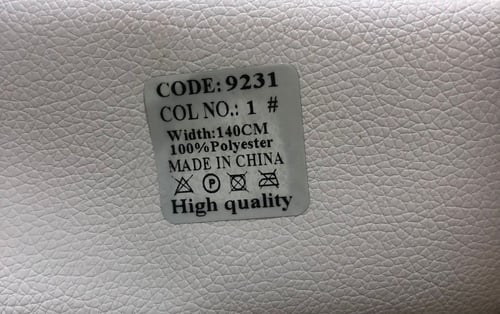 كرسي بذراعين جلد