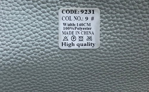 كرسي بذراعين جلد