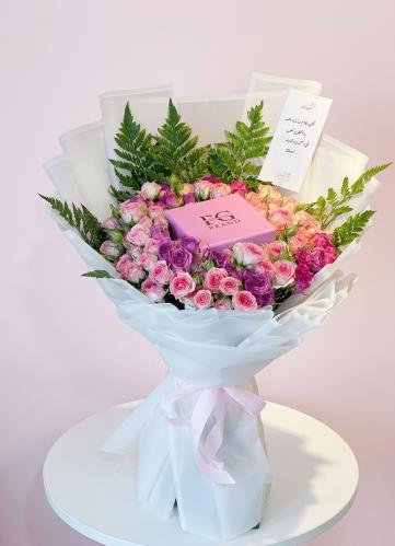 A bouquet of flowers and a chain brand FG silver 9...