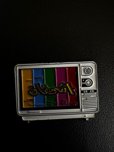 ملصق معدني تلفاز