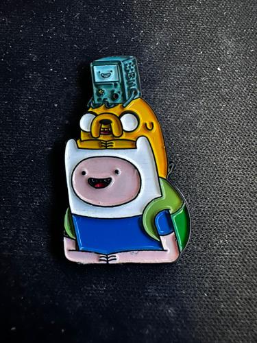 ملصق معدني فين و جيك