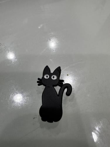 ملصق معدني قط أسود