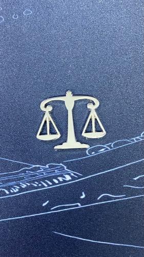 ملصق حديد شعار ميزان العدل